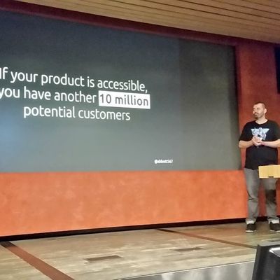 Craig presents in front of a slide reading "If your product is accessible, you have another 10 million potential customers".